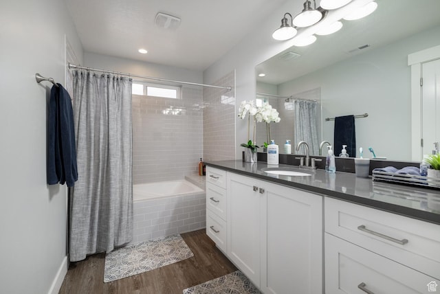 4093 E 4000 S, Vernal, UT 84078 - bathroom with wood-type flooring, shower / bath combo, and vanity