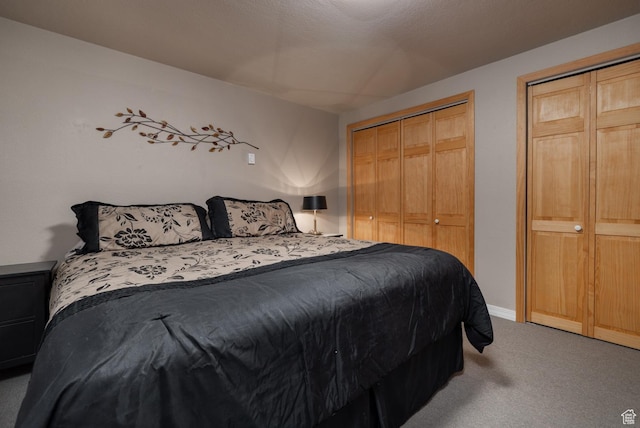 4111 E 4000 S, Vernal, UT 84078 - carpeted bedroom featuring two closets