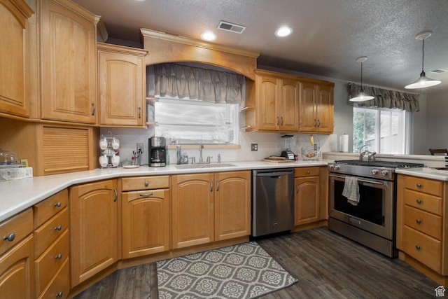 4111 E 4000 S, Vernal, UT 84078 - kitchen featuring decorative light fixtures, sink, stainless steel appliances, dark wood-type flooring, and a textured ceiling