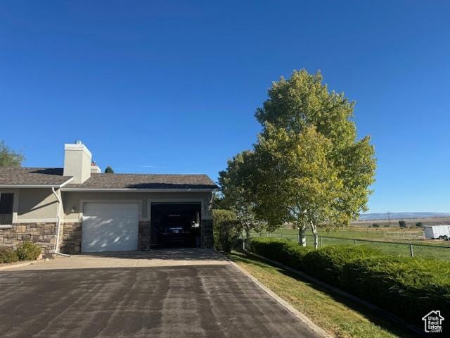 4111 E 4000 S, Vernal, UT 84078 - view of side of property featuring a garage