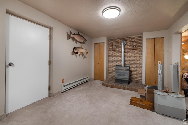 4111 E 4000 S, Vernal, UT 84078 - unfurnished living room with a baseboard radiator, light colored carpet, a textured ceiling, and a wood stove
