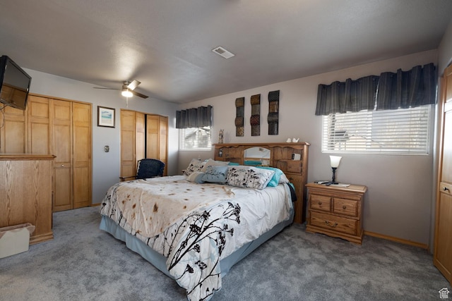 4111 E 4000 S, Vernal, UT 84078 - carpeted bedroom featuring ceiling fan and two closets