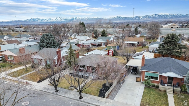 aerial view featuring a residential view and a mountain view