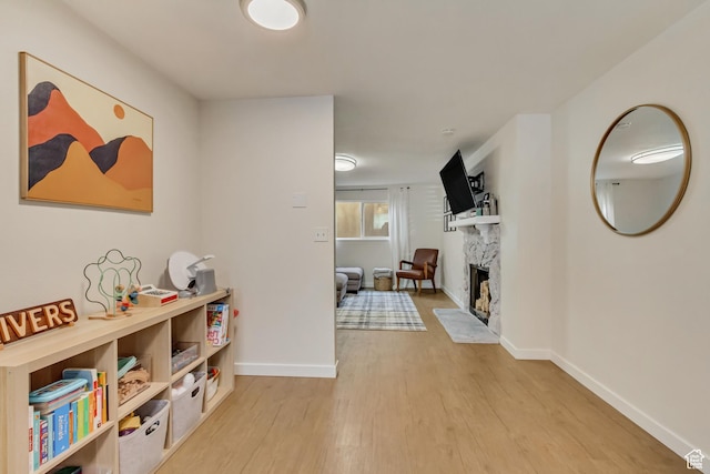 corridor featuring light hardwood / wood-style floors
