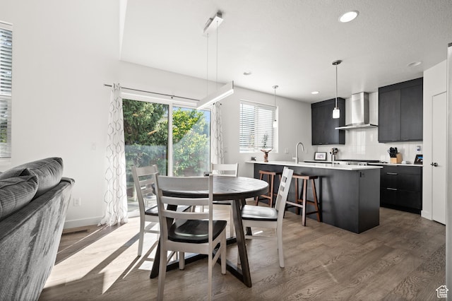 4513 S Bleecker Pl E, Millcreek, UT 84117 - dining area featuring dark hardwood / wood-style floors and sink