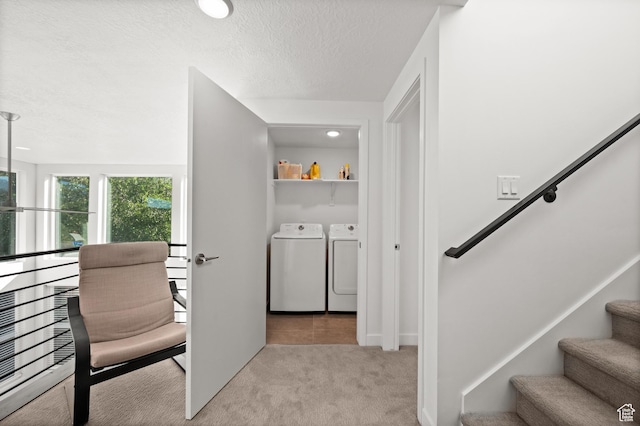 4513 S Bleecker Pl E, Millcreek, UT 84117 - interior space featuring separate washer and dryer, light colored carpet, and a textured ceiling