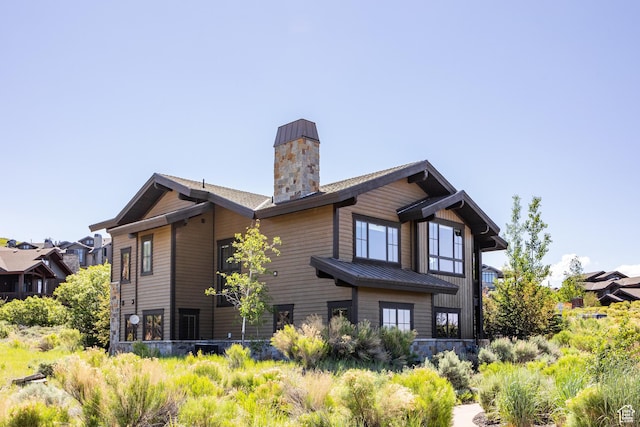 10725 N Hideout Trl, Hideout, UT 84036 - back of house with a chimney and a metal roof