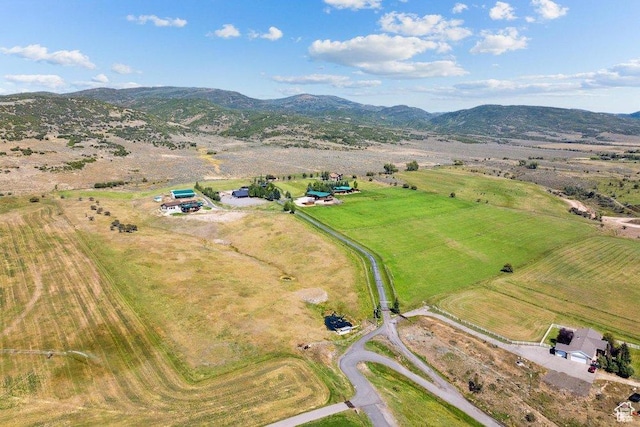 6117 Rocky Ridge Rd N, Peoa, UT 84061 - drone / aerial view featuring a rural view and a mountain view