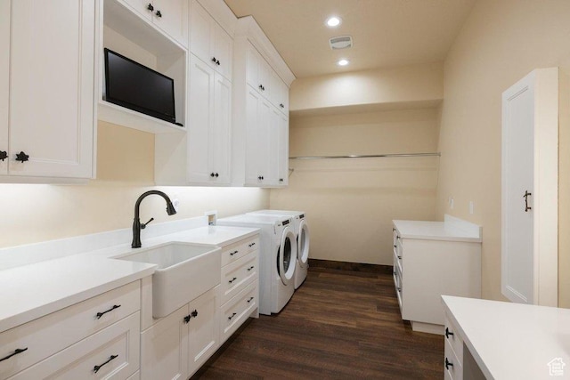 6117 Rocky Ridge Rd N, Peoa, UT 84061 - clothes washing area featuring dark wood-type flooring, cabinets, separate washer and dryer, and sink