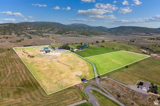 bird's eye view with a mountain view and a rural view