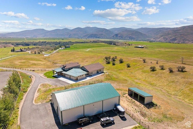 6117 Rocky Ridge Rd N, Peoa, UT 84061 - drone / aerial view with a mountain view and a rural view