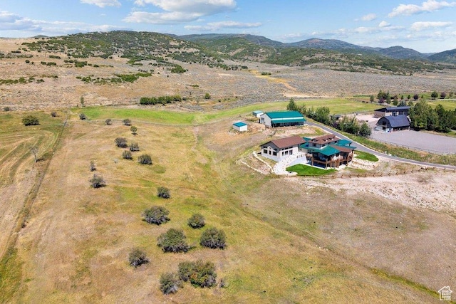 6117 Rocky Ridge Rd N, Peoa, UT 84061 - drone / aerial view with a mountain view and a rural view
