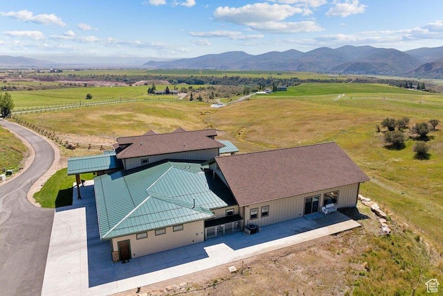 6117 Rocky Ridge Rd N, Peoa, UT 84061 - drone / aerial view featuring a mountain view and a rural view
