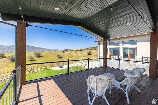 6117 Rocky Ridge Rd N, Peoa, UT 84061 - wooden terrace featuring a mountain view and a rural view