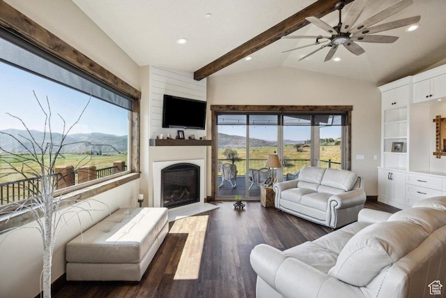 6117 Rocky Ridge Rd N, Peoa, UT 84061 - living room with lofted ceiling with beams, dark wood-type flooring, and ceiling fan