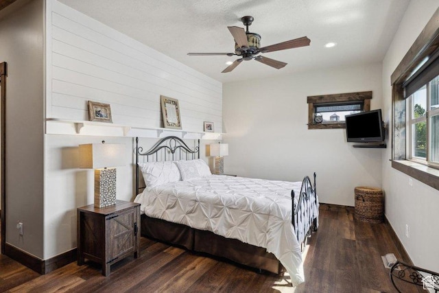 6117 Rocky Ridge Rd N, Peoa, UT 84061 - bedroom with dark hardwood / wood-style floors and a textured ceiling