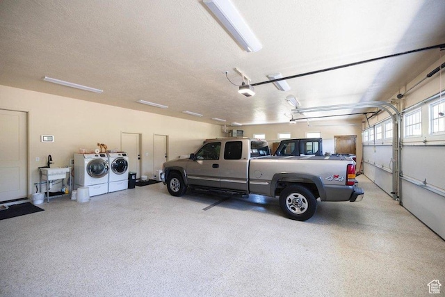 6117 Rocky Ridge Rd N, Peoa, UT 84061 - garage featuring a garage door opener and independent washer and dryer