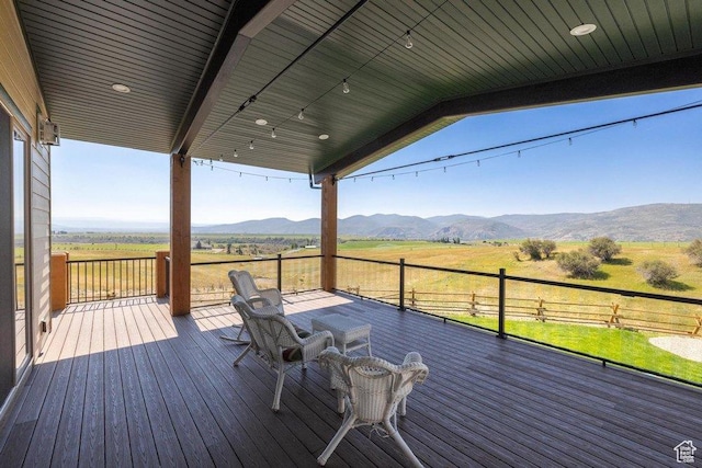 6117 Rocky Ridge Rd N, Peoa, UT 84061 - wooden terrace featuring a rural view and a mountain view