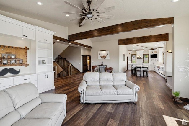 6117 Rocky Ridge Rd N, Peoa, UT 84061 - living room with beam ceiling, dark wood-type flooring, and ceiling fan