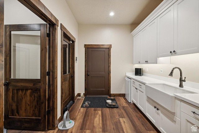 6117 Rocky Ridge Rd N, Peoa, UT 84061 - washroom featuring dark wood-type flooring and sink