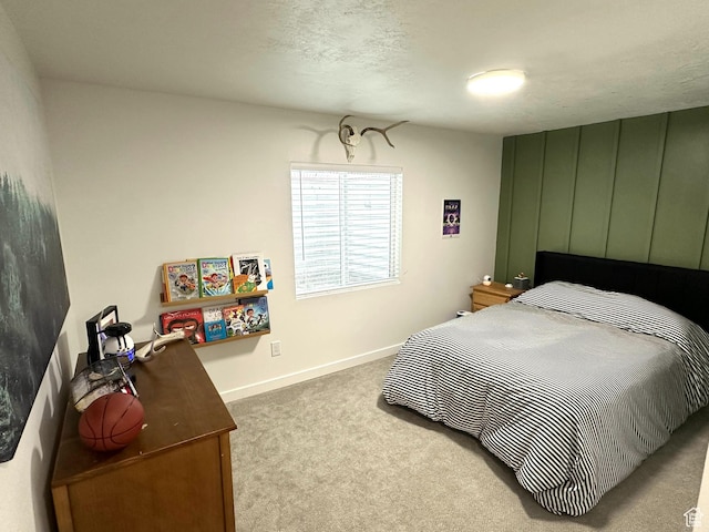 bedroom featuring light colored carpet