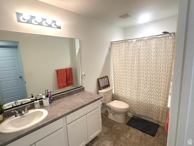 full bathroom featuring vanity, toilet, and shower / bath combo