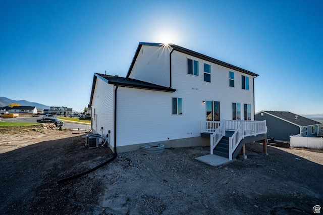 831 E 490 N Unit 143, Hyde Park, UT 84318 - rear view of house with a mountain view and central AC