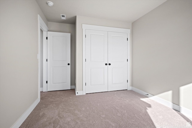 831 E 490 N Unit 143, Hyde Park, UT 84318 - unfurnished bedroom featuring light colored carpet and a closet