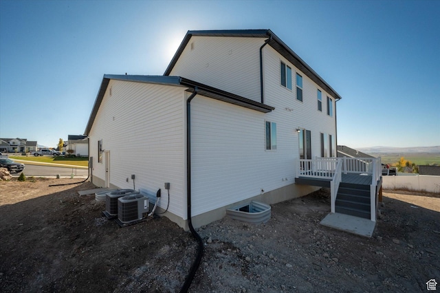 831 E 490 N Unit 143, Hyde Park, UT 84318 - back of house with central AC unit and a deck