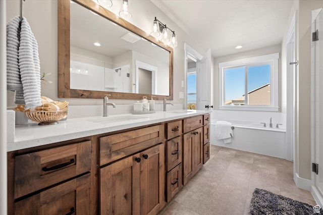 831 E 490 N Unit 143, Hyde Park, UT 84318 - bathroom featuring tile patterned floors, vanity, and separate shower and tub