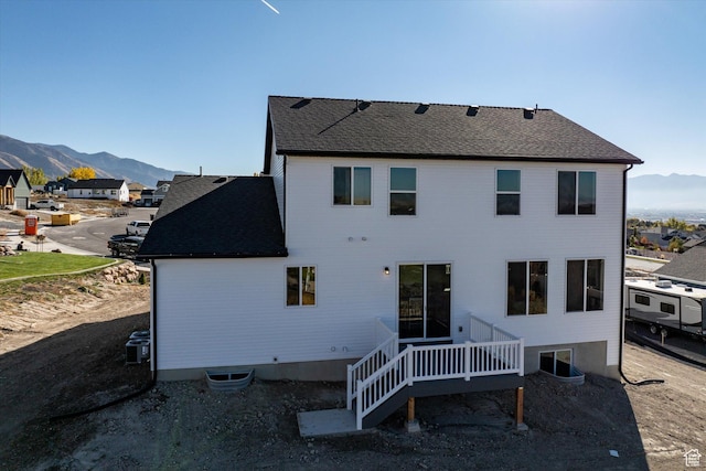 831 E 490 N Unit 143, Hyde Park, UT 84318 - rear view of property featuring central AC and a deck with mountain view