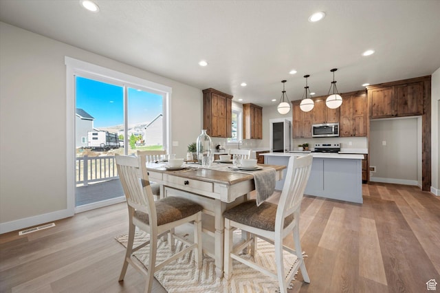 831 E 490 N Unit 143, Hyde Park, UT 84318 - dining room featuring light hardwood / wood-style floors