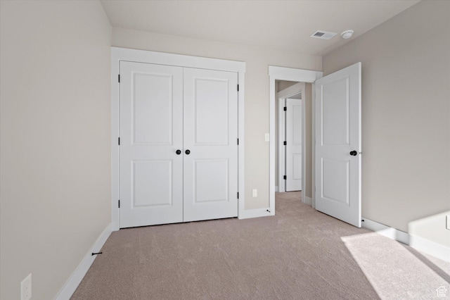 831 E 490 N Unit 143, Hyde Park, UT 84318 - unfurnished bedroom featuring light carpet and a closet