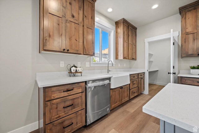 831 E 490 N Unit 143, Hyde Park, UT 84318 - kitchen featuring sink, stainless steel dishwasher, and light hardwood / wood-style floors