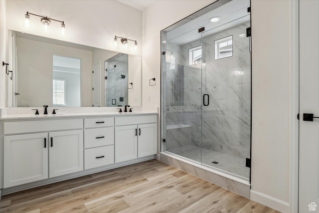 6199 W Wapiti Ridge Ln Unit 333, Herriman, UT 84096 - bathroom with vanity, hardwood / wood-style flooring, and walk in shower