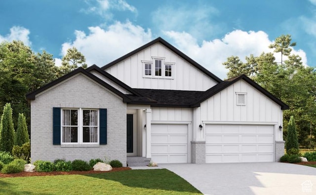view of front of house featuring a garage and a front lawn