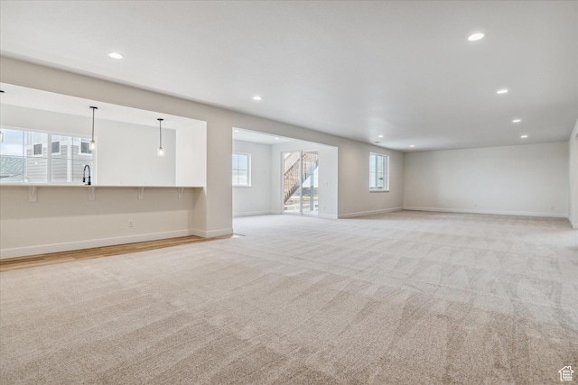 6199 W Wapiti Ridge Ln Unit 333, Herriman, UT 84096 - basement with light colored carpet and sink