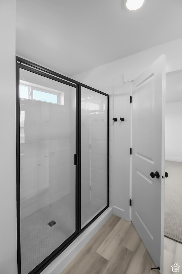 3463 W 3175 N Unit 362, Plain City, UT 84404 - bathroom featuring wood-type flooring and a shower with shower door