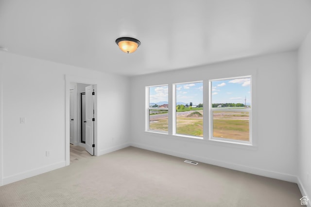 3463 W 3175 N Unit 362, Plain City, UT 84404 - spare room featuring light colored carpet
