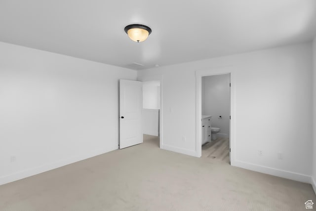 3463 W 3175 N Unit 362, Plain City, UT 84404 - unfurnished bedroom with ensuite bath, light colored carpet, and a spacious closet