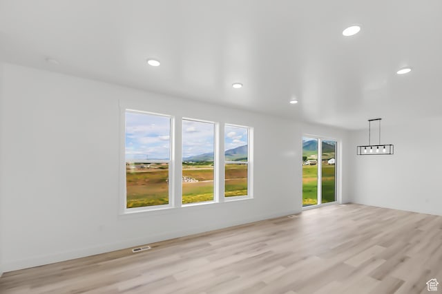 3463 W 3175 N Unit 362, Plain City, UT 84404 - empty room with light hardwood / wood-style floors