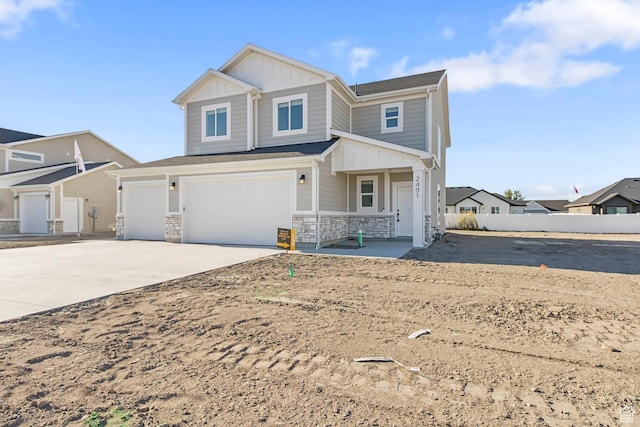 view of front of property featuring a garage