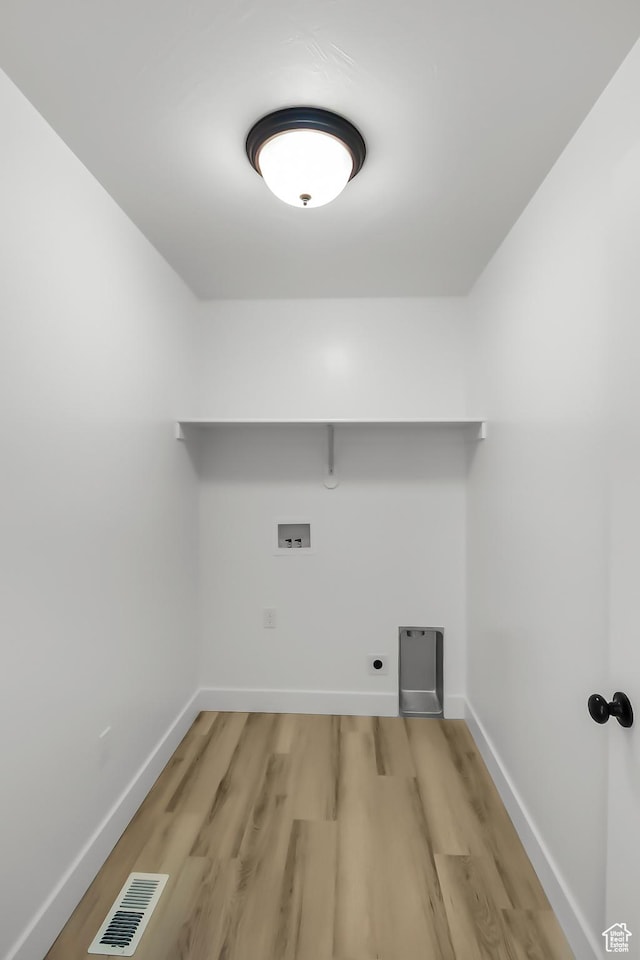 3463 W 3175 N Unit 362, Plain City, UT 84404 - laundry area featuring hookup for a washing machine, electric dryer hookup, and light hardwood / wood-style flooring