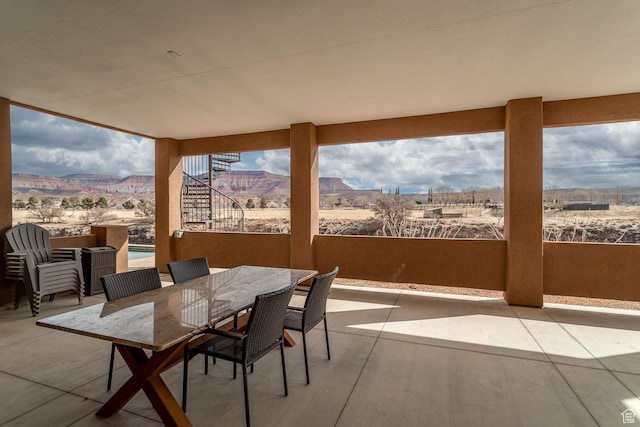 view of patio / terrace with a mountain view