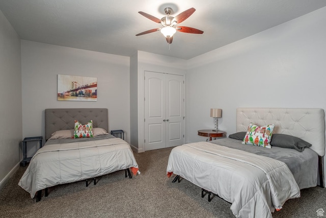 bedroom with carpet, baseboards, a closet, and a ceiling fan