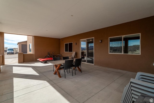 view of patio featuring outdoor dining space