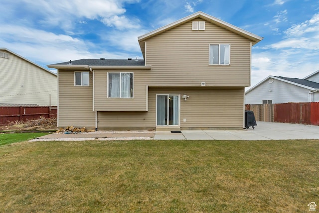 502 N Hidden Cv E, Ogden, UT 84404 - back of property with a yard and a patio