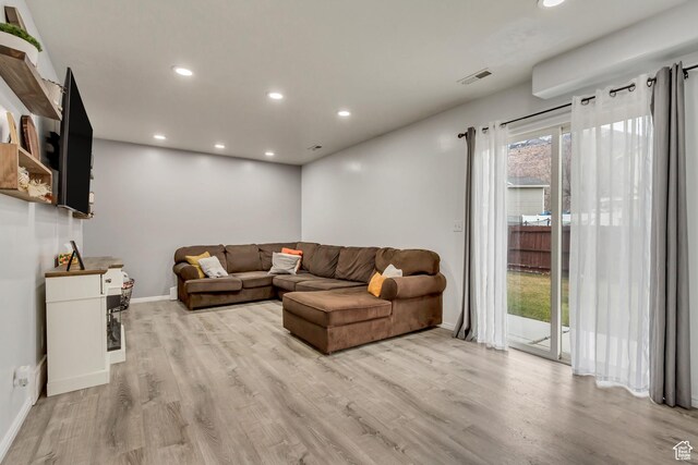 502 N Hidden Cv E, Ogden, UT 84404 - living room with light hardwood / wood-style floors