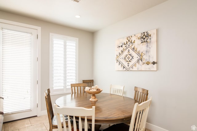 dining room with light tile patterned floors