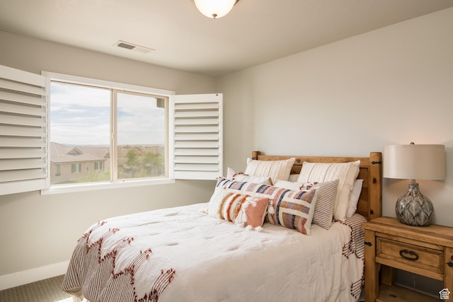 bedroom featuring carpet flooring